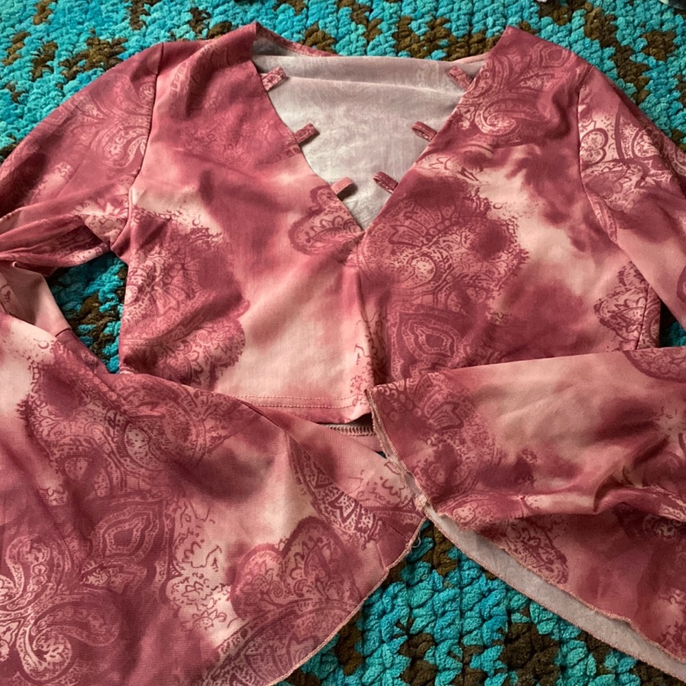 Pink flared out arms